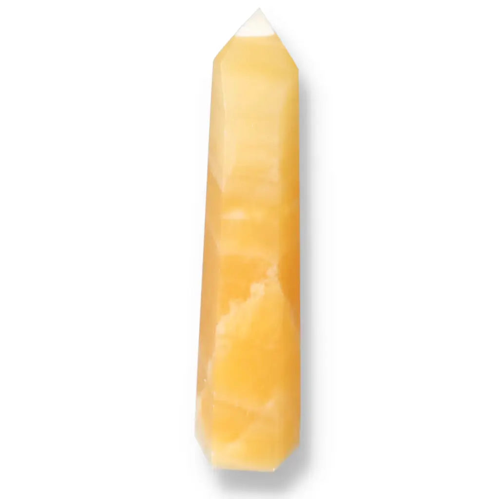 Mexican Calcite Obelisk by Sylvia Crystals, enhancing motivation, focus, and energy for personal and professional growth.
