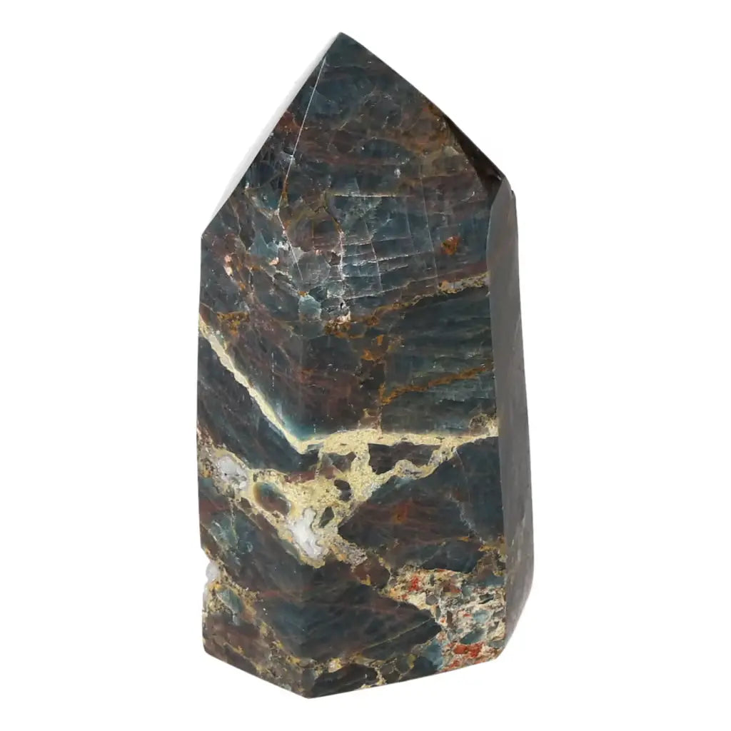 Apatite Obelisk from Sylvia Crystals, showcasing its luxurious blend of aesthetics and spiritual elegance, perfect for crystal collections.
