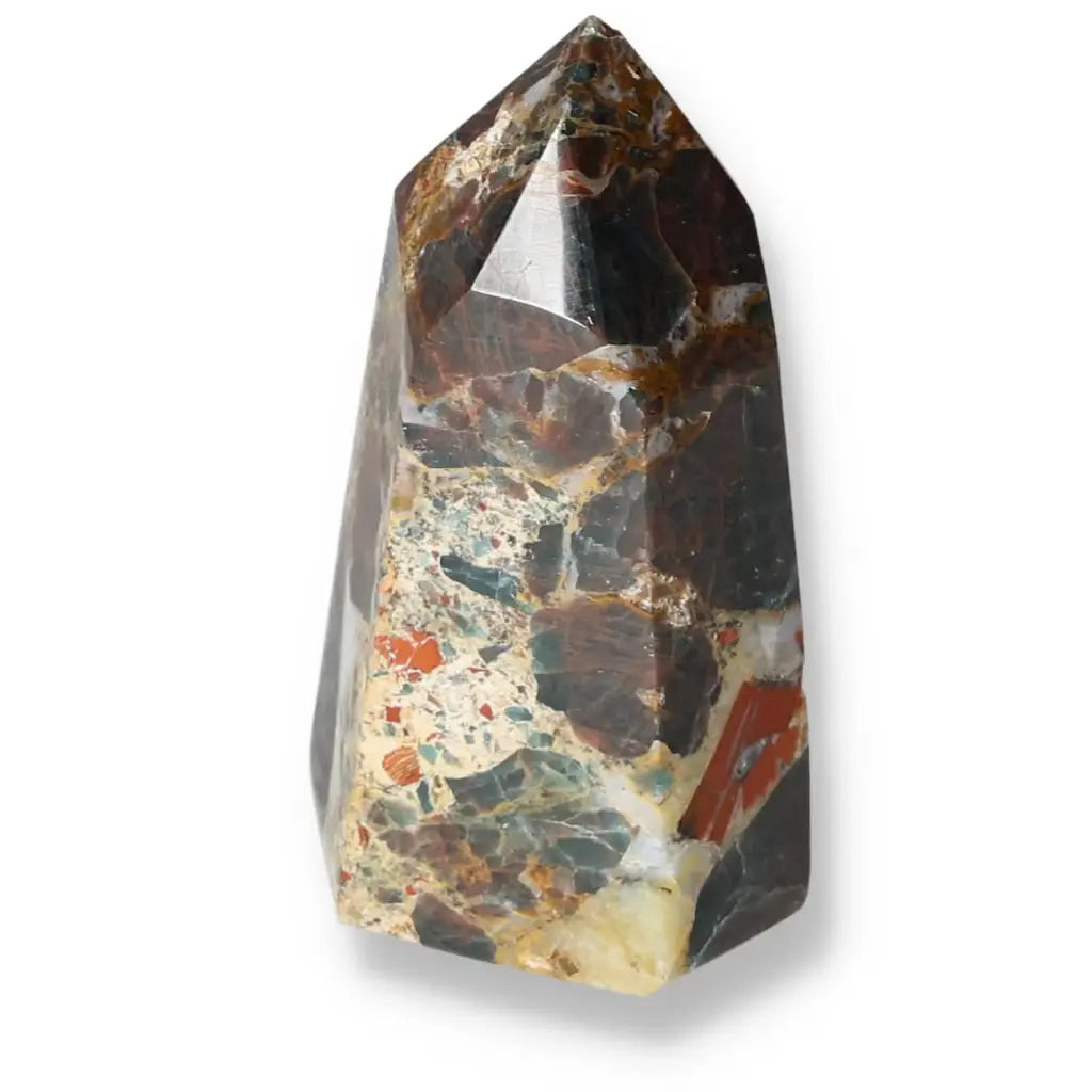 Apatite Obelisk by Sylvia Crystals, showcasing a blend of colors and textures, a symbol of luxury, spirituality, and positive energy.
