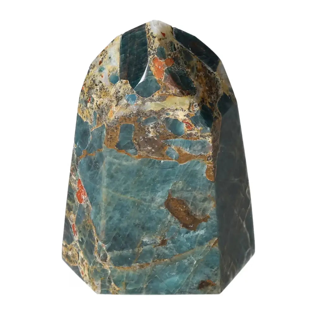 Apatite Obelisk by Sylvia Crystals, showcasing its natural allure and vibrant colors, symbolizing harmony between spirit and matter.