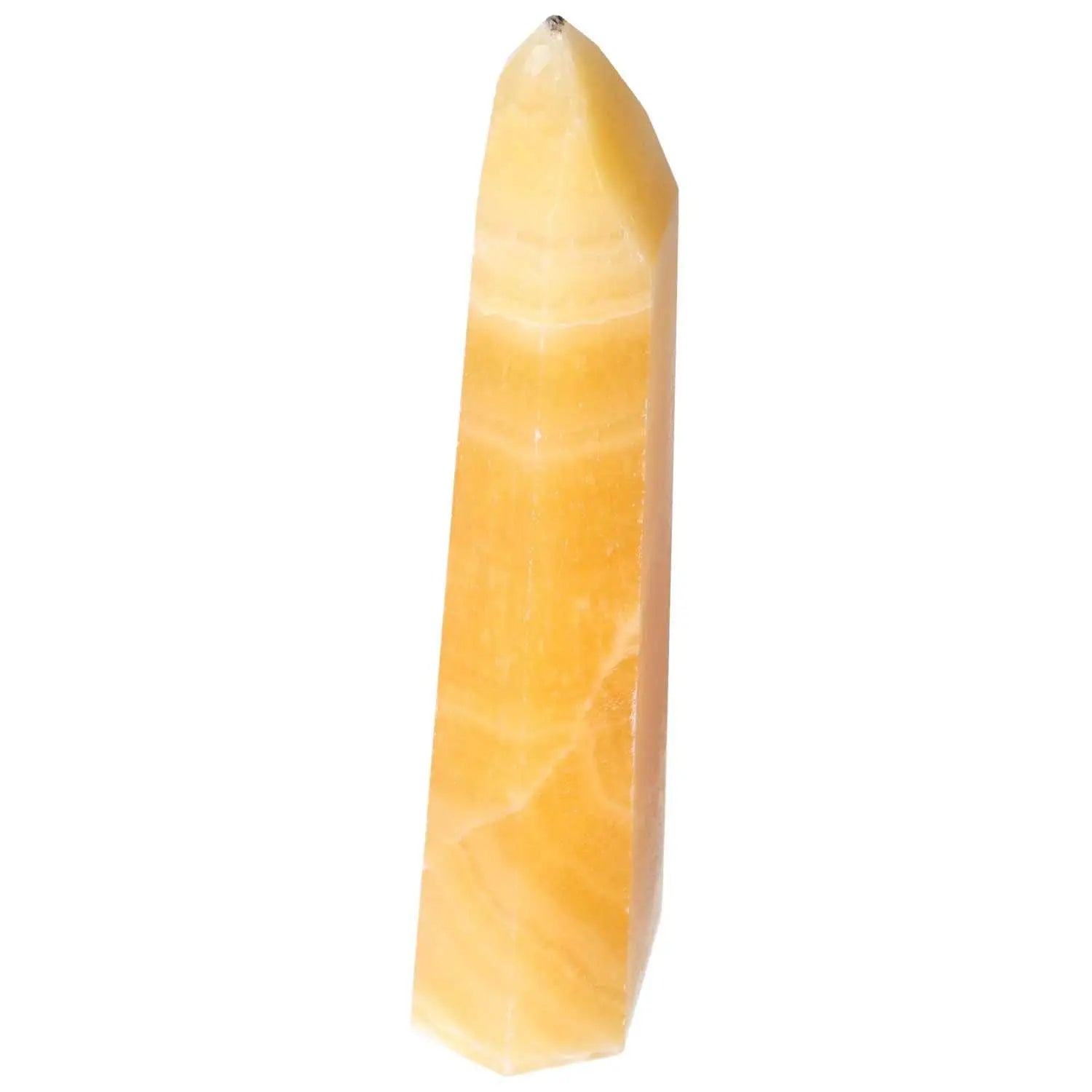 Mexican Calcite Obelisk from Sylvia Crystals, enhancing self-confidence and spiritual elegance, handpicked for conscious luxury.