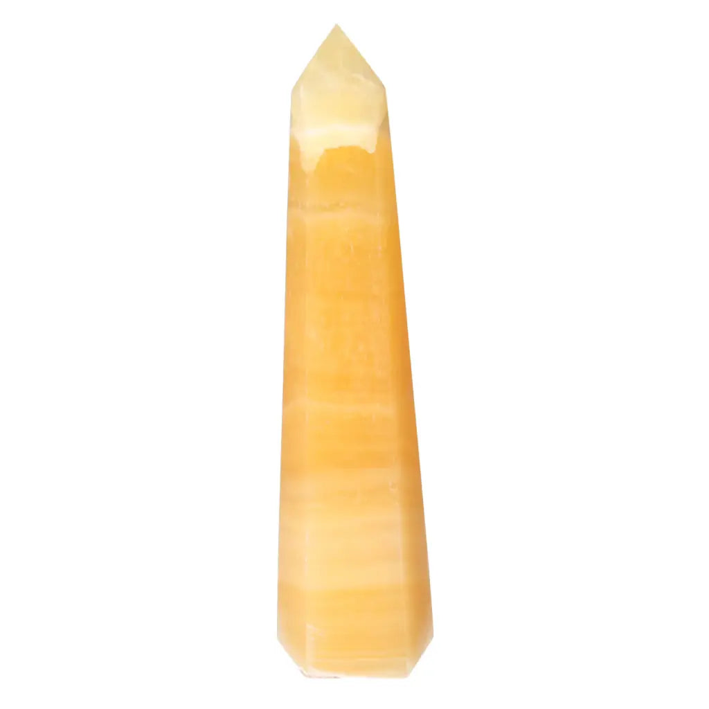 Mexican Calcite Obelisk by Sylvia Crystals, a luxurious spiritual energy enhancer known for boosting self-confidence and motivation.