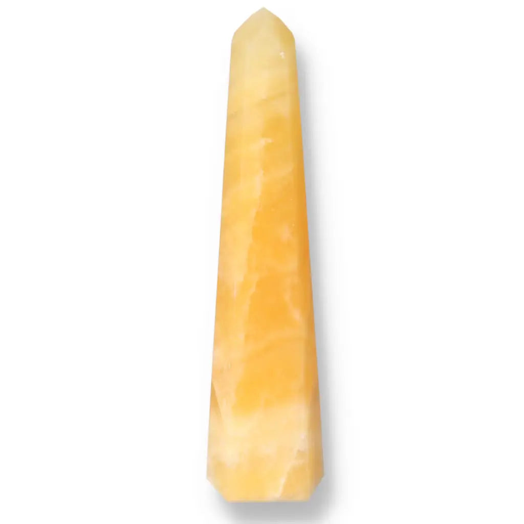 Mexican Calcite Obelisk from Sylvia Crystals, handpicked for elegance and positivity, enhancing self-confidence and motivation.