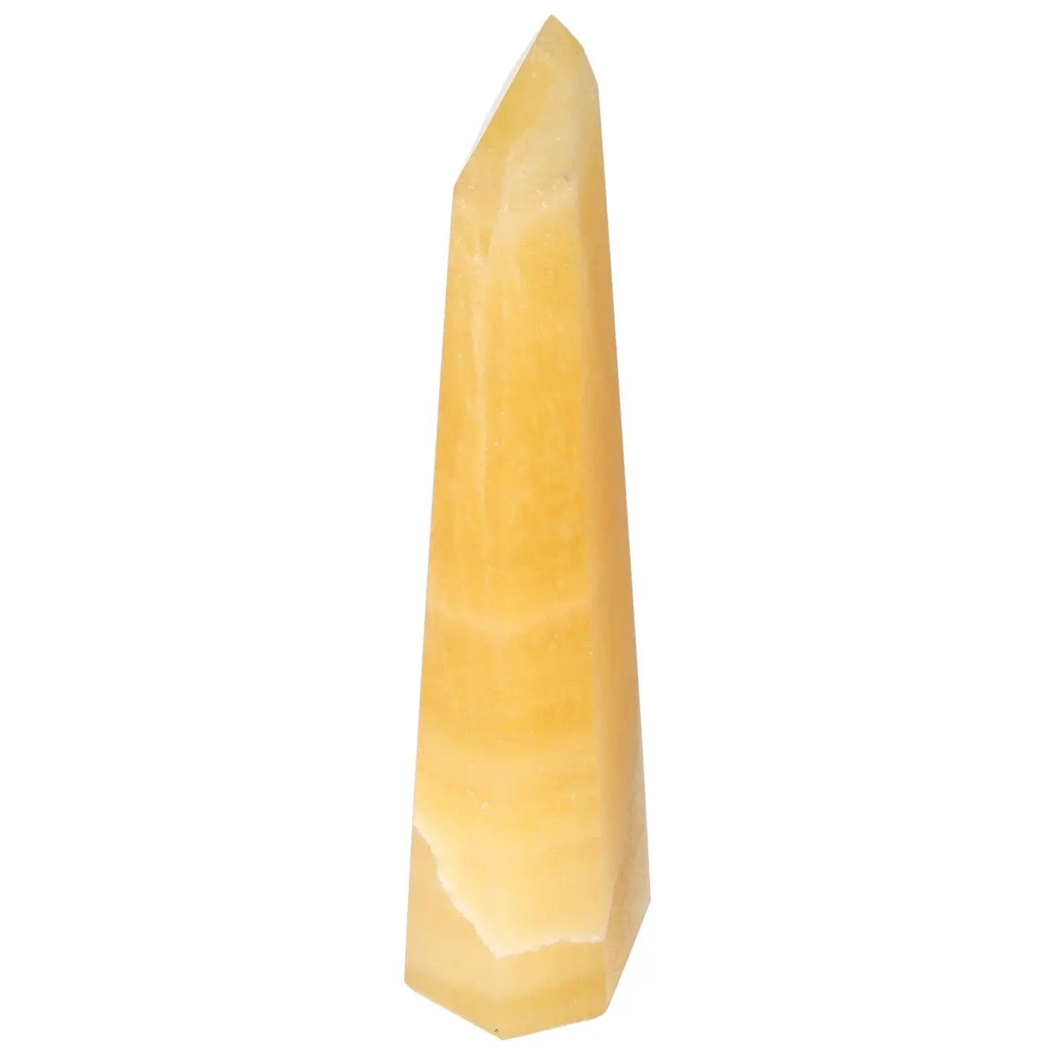 Mexican Calcite Obelisk from Sylvia Crystals, symbolizing positivity and inspiration, handpicked for enhancing self-confidence and goal achievement.