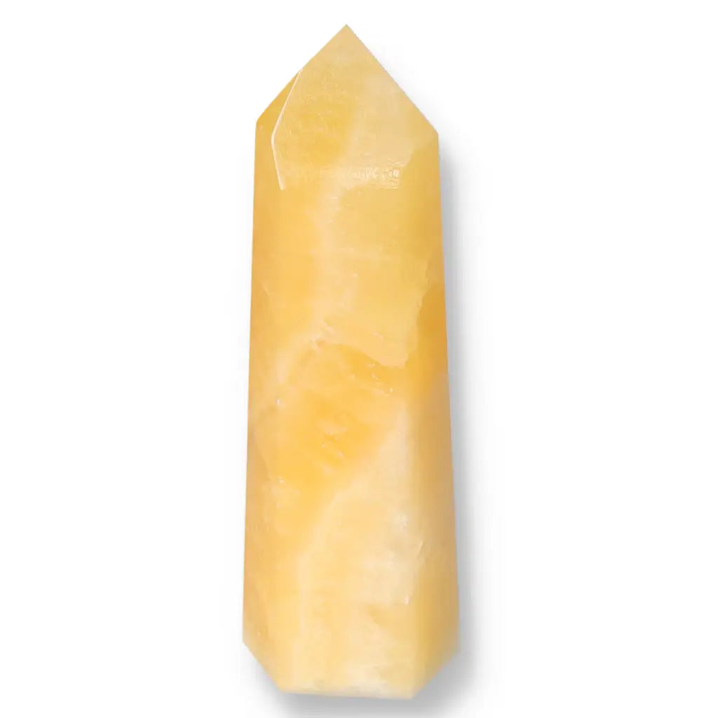 Elegant Mexican Calcite Obelisk for energy transformation and decor from Sylvia Crystals.