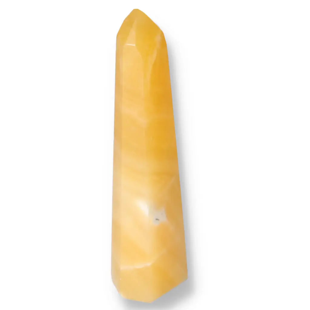 Mexican Calcite Obelisk by Sylvia Crystals, a premium decorative and spiritual piece for growth and transformation.