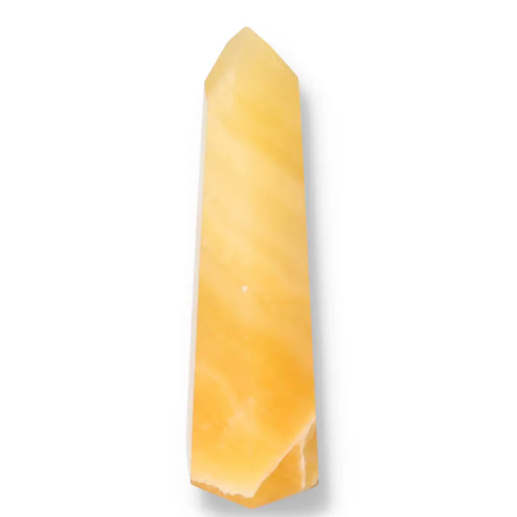 Elegant Mexican Calcite Obelisk from Sylvia Crystals, enhancing confidence and motivation, perfect for students and professionals.