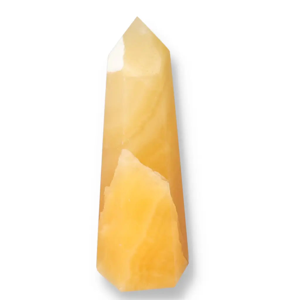 Mexican Calcite Obelisk from Sylvia Crystals, enhancing self-confidence and motivation, great for luxury and spiritual growth.