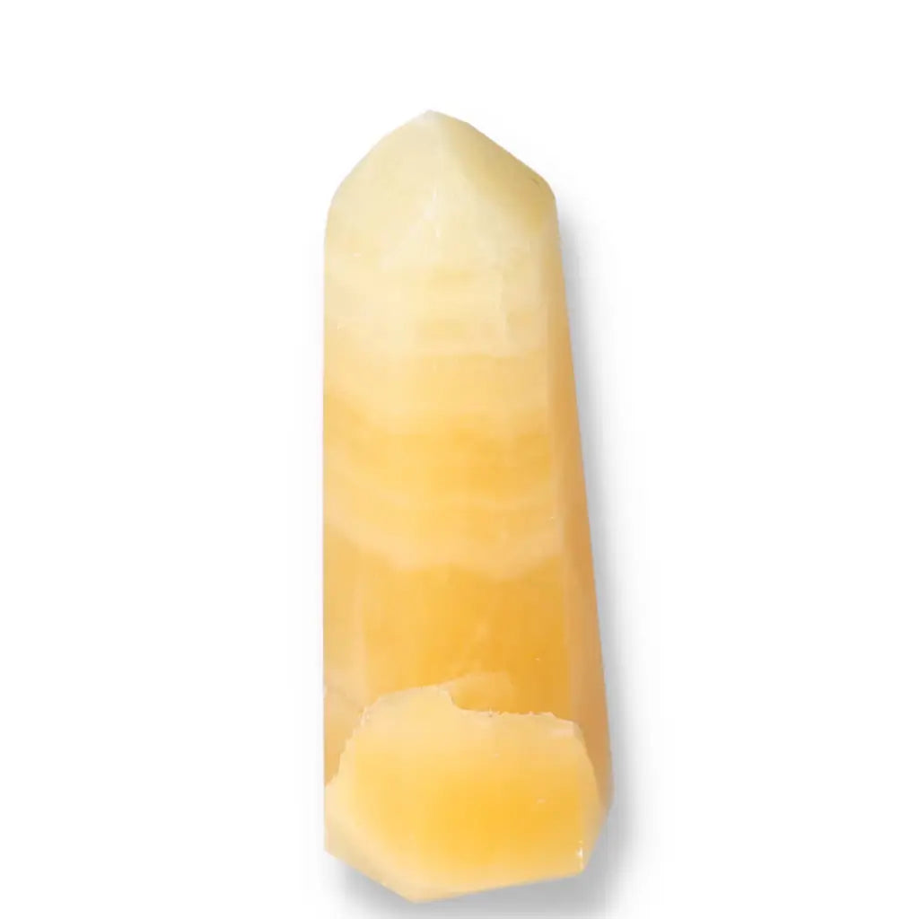 Elegant Mexican Calcite Obelisk by Sylvia Crystals, fostering positive energy, self-confidence, and personal growth.
