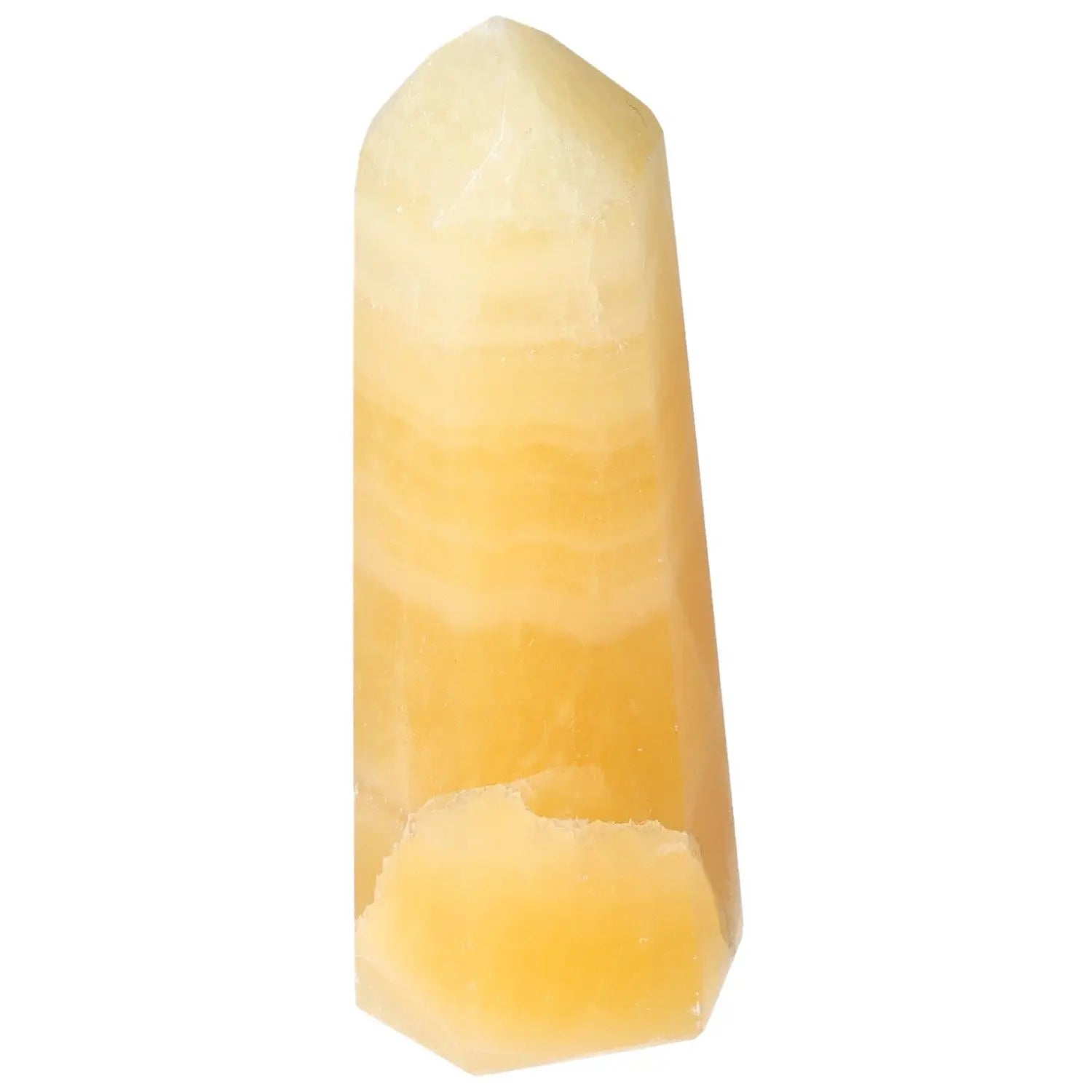 Mexican Calcite Obelisk from Sylvia Crystals, a luxurious mineral known for boosting self-confidence and personal transformation.