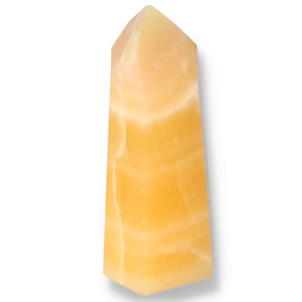 Mexican Calcite Obelisk by Sylvia Crystals, symbolizing spiritual awakening and elegance, boosts confidence and motivation.