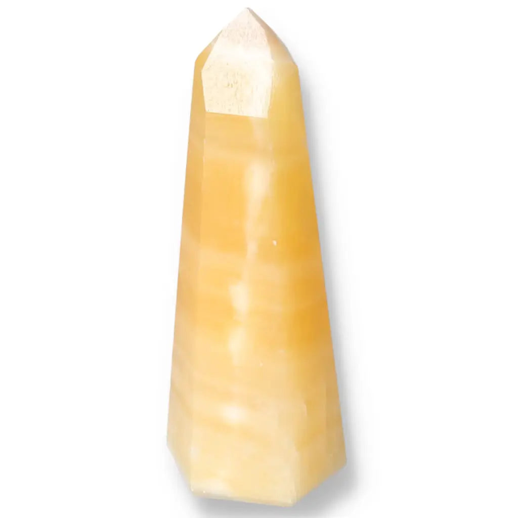 Mexican Calcite Obelisk by Sylvia Crystals, enhancing energy and self-confidence, a premium spiritual growth tool.