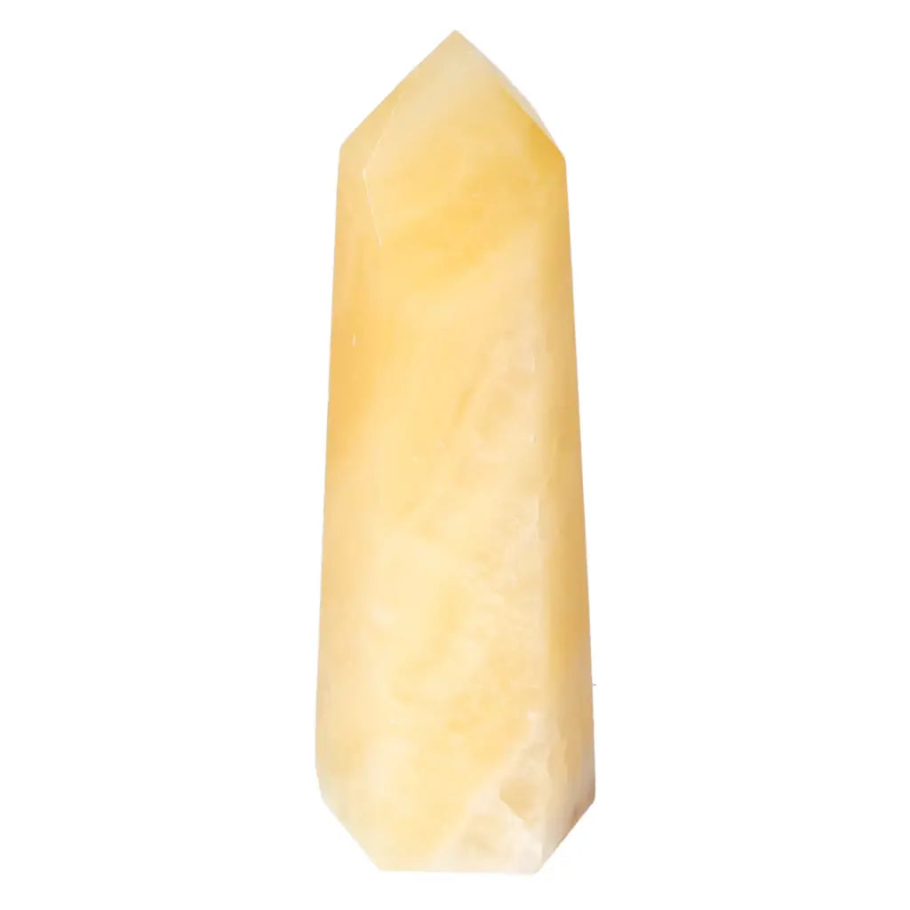 Mexican Calcite Obelisk showcasing its elegant yellow hue, symbolizing Sylvia Crystals' timeless elegance and energy enhancement.