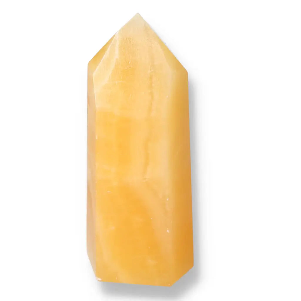 Mexican Calcite Obelisk by Sylvia Crystals, offering spiritual illumination and positive energy enhancement.