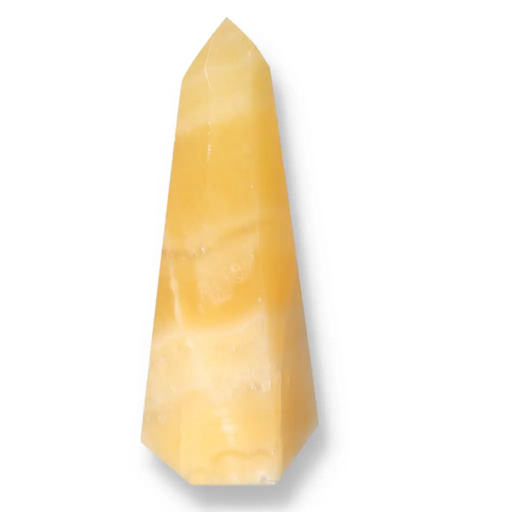 Elegant Mexican Calcite Obelisk from Sylvia Crystals, enhancing spirituality and luxury. Perfect for conscious aesthetic beauty seekers.