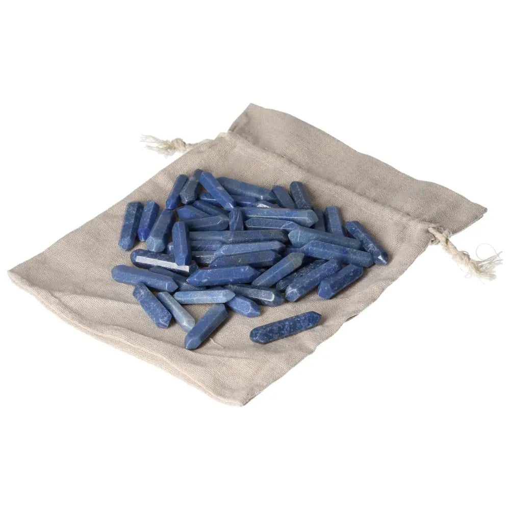 Blue Aventurine Small Sticks on beige cloth bag, ideal for spiritual awakening and personal transformation.