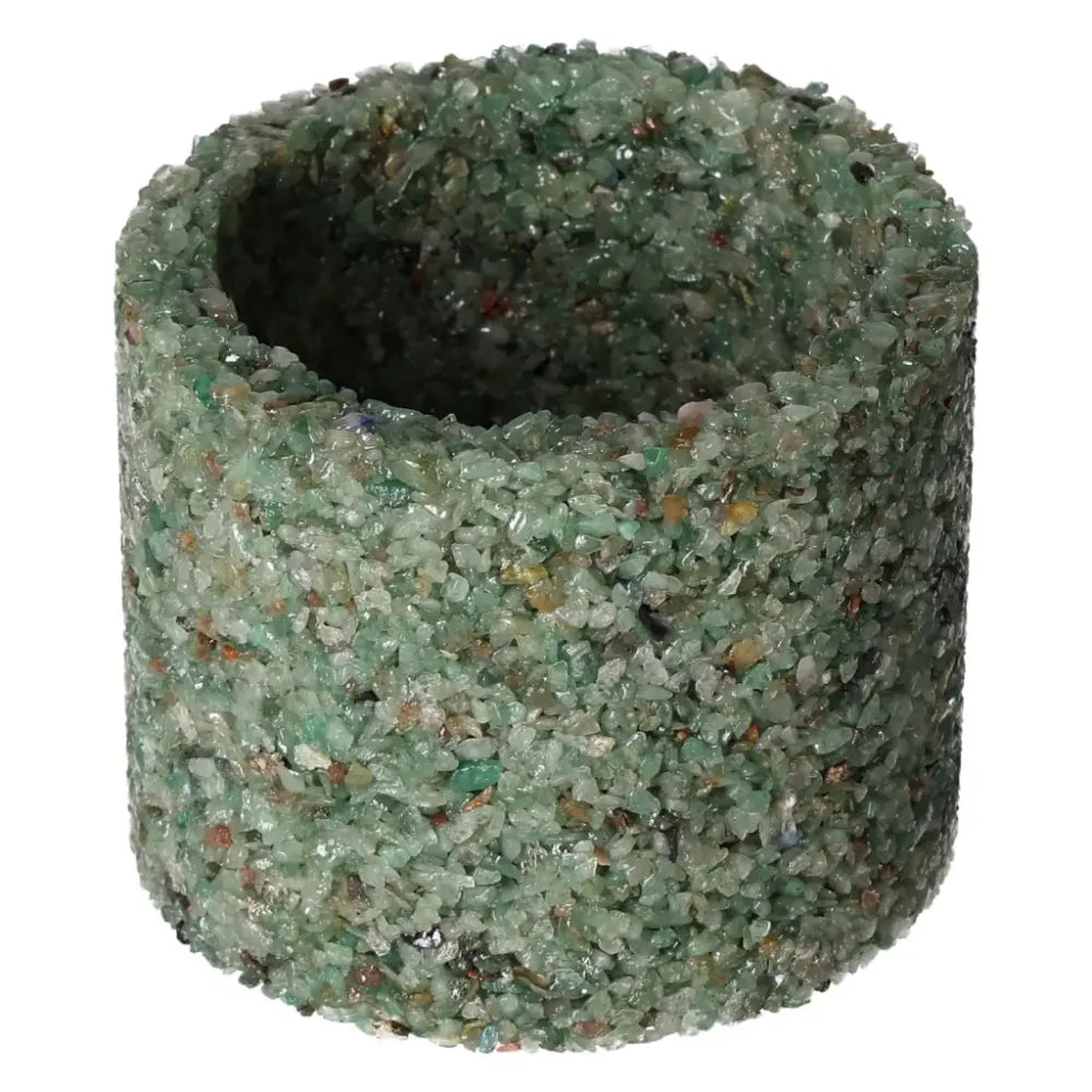 Green quartz candle holder with a textured surface, embodying elegance and energy, perfect for decoration and spiritual synergy.