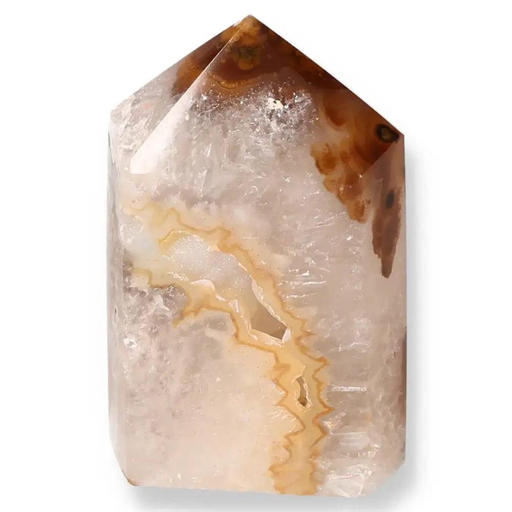 Agate Geoded Point crystal showcasing natural hues and intricate patterns for energy harmonization and grounding influence.