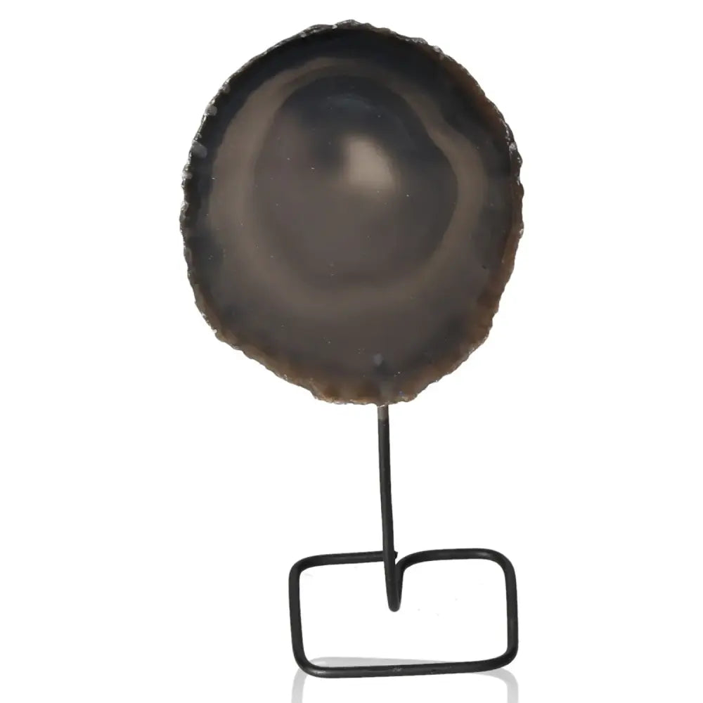 Agate Slice on elegant metal stand showcasing unique patterns and colors, perfect for energy harmonization and stunning decor.