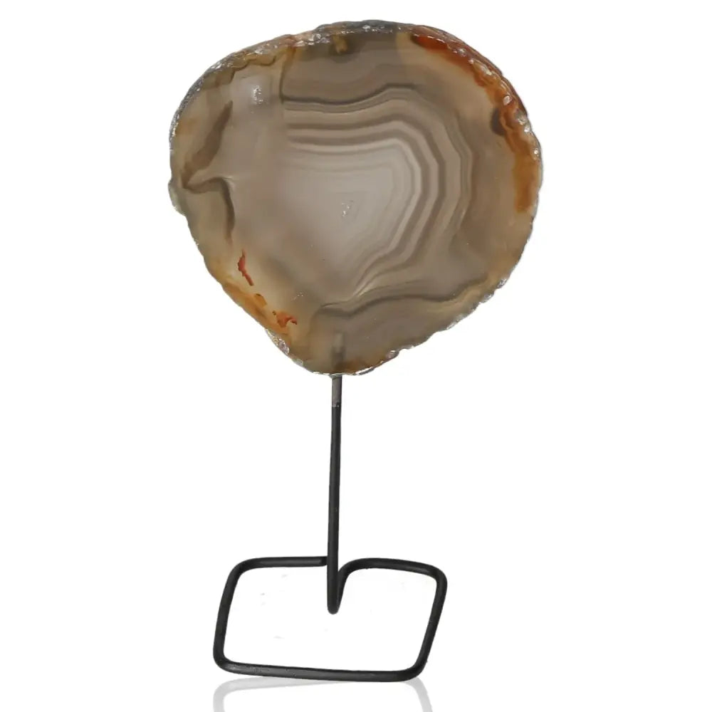 Agate Slice on Metal Stand showcasing natural beauty and tranquility, ideal for enhancing any space with peace and holistic benefits.