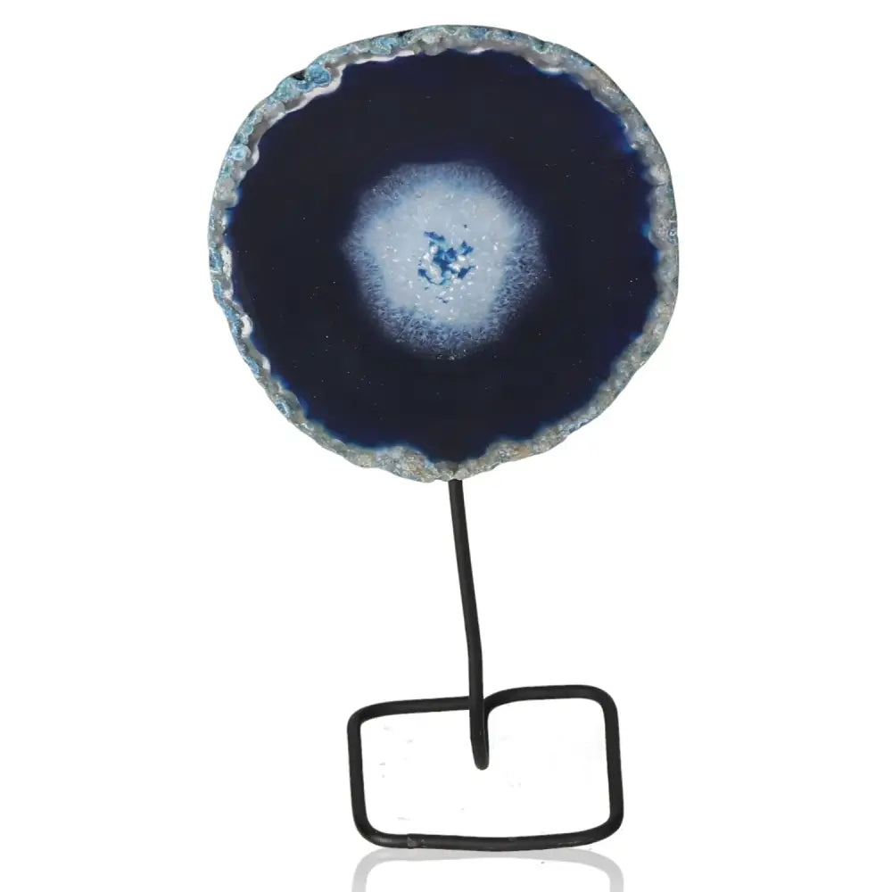Blue agate slice on metal stand, ideal for balancing energy and promoting tranquility, enhancing home decor with natural beauty.