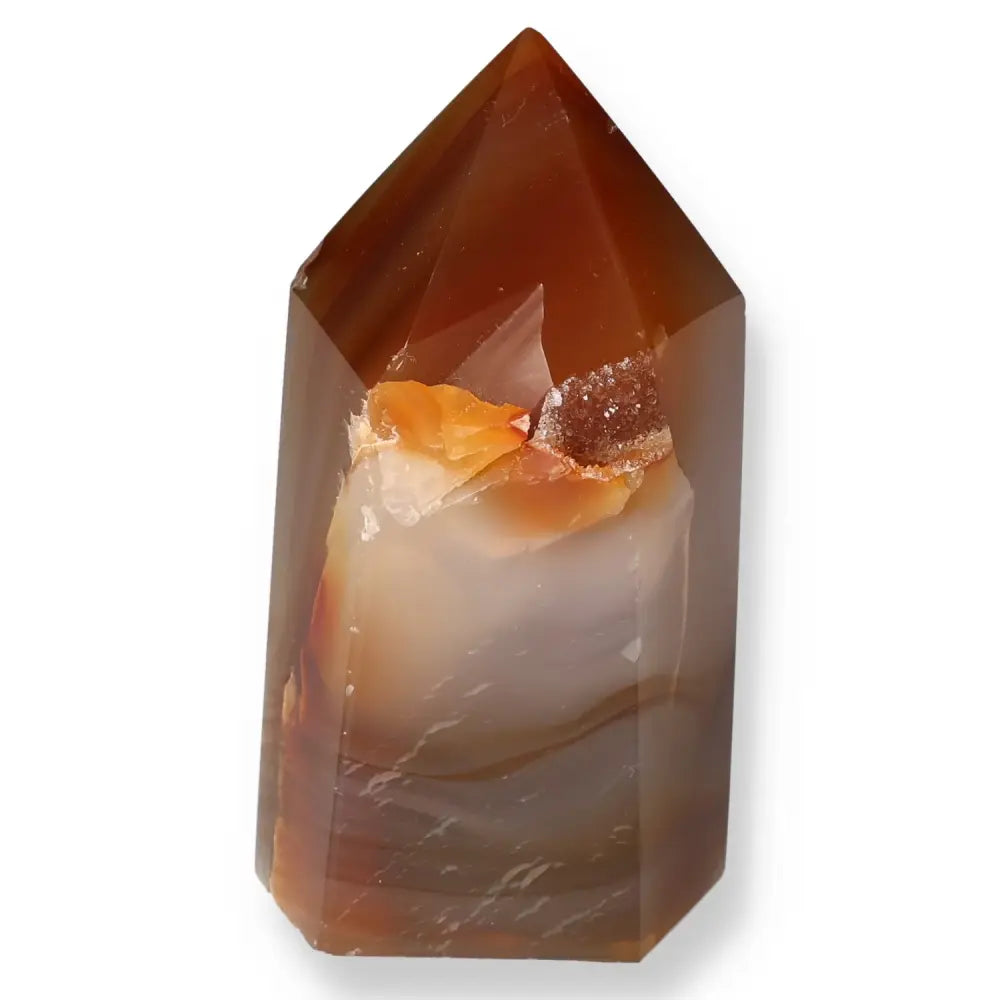 Agate Geoded Point featuring natural hues and unique energy-balancing properties, perfect for enhancing tranquility and creativity.