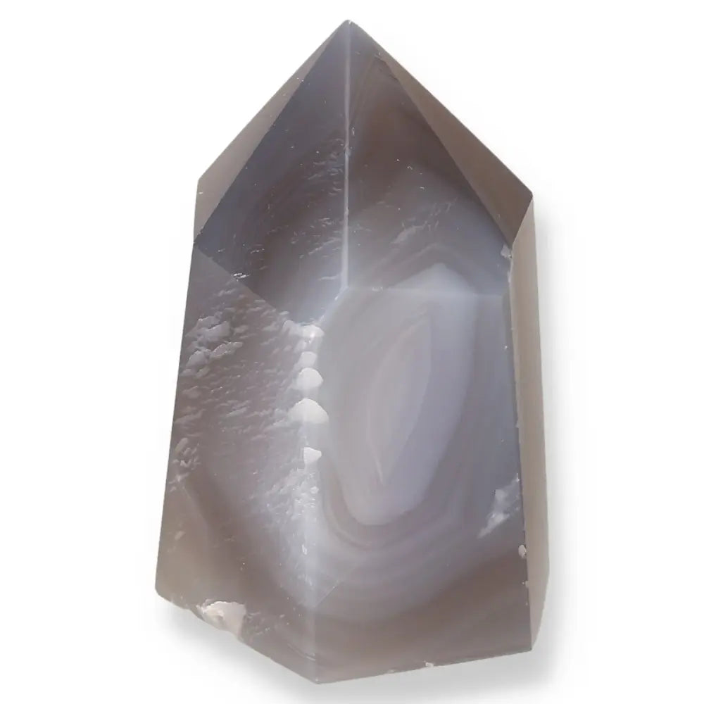 Agate Geoded Point featuring intricate patterns and natural elegance, ideal for enhancing personal growth and balance.