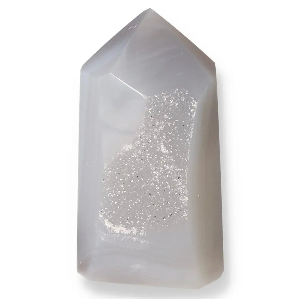 Agate Geoded Point with intricate formations showcasing natural beauty and energy harmonizing properties.