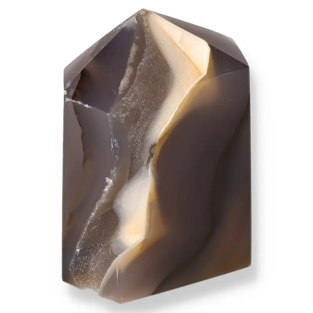 Agate Geode Point displaying intricate natural patterns with soothing earthy tones, perfect for enhancing energy and aesthetic appeal.