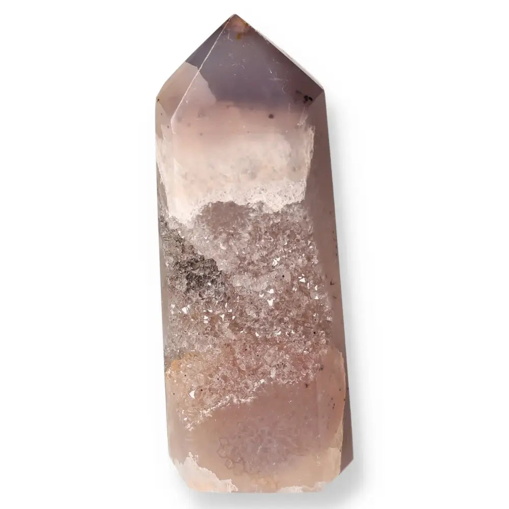 Polished agate geode point with intricate crystalline patterns and soft brown hues for energy harmonizing.
