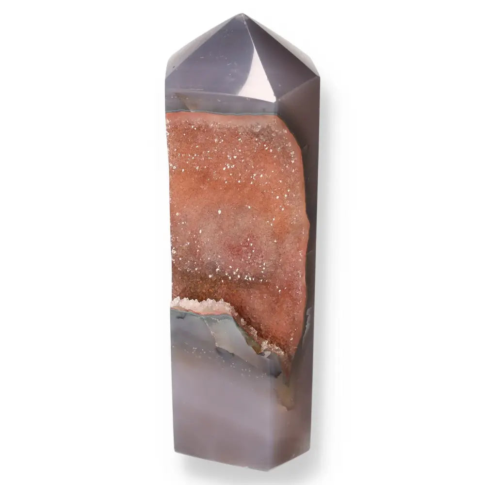 Agate Geoded Point gemstone, known for harmonizing energy, featuring unique natural patterns and calming effects for mind and body.