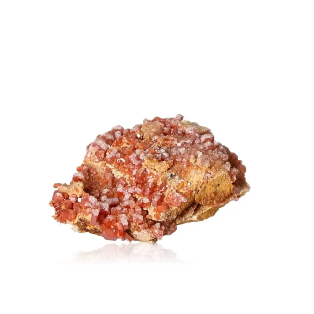 Vanadinite crystal with vibrant red-orange hues, renowned for its unique formations, ideal for creativity and focus seekers.