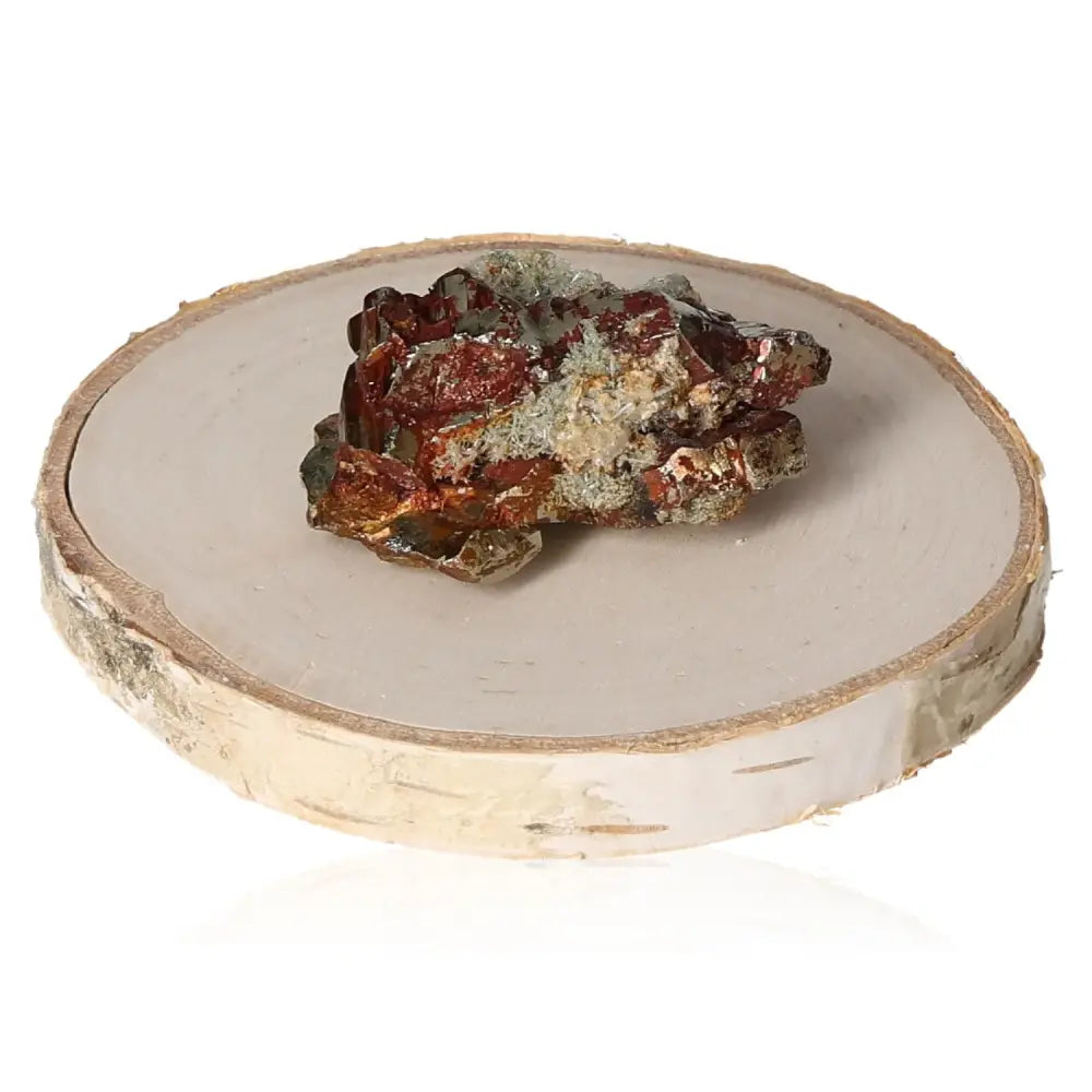 Pyrite mineral on natural wooden base, showcasing its golden hue and metallic luster, known as Fool's Gold for its resemblance to real gold.