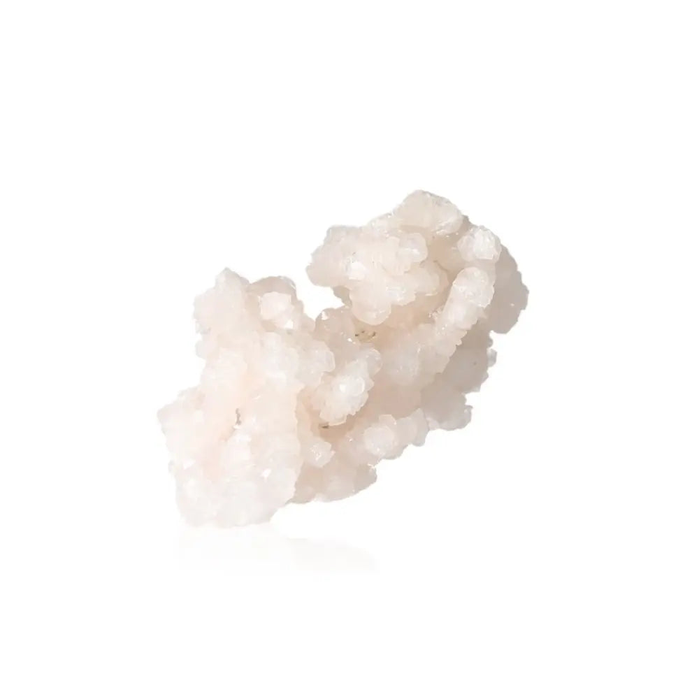 White calcite crystal cluster for energy amplification, healing, and spiritual growth on a white background.