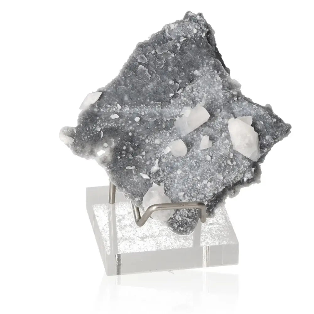 Gray chalcedony quartz crystal on display, known for amplifying energy, clarity, and focus, ideal for meditation and enhancing stones.