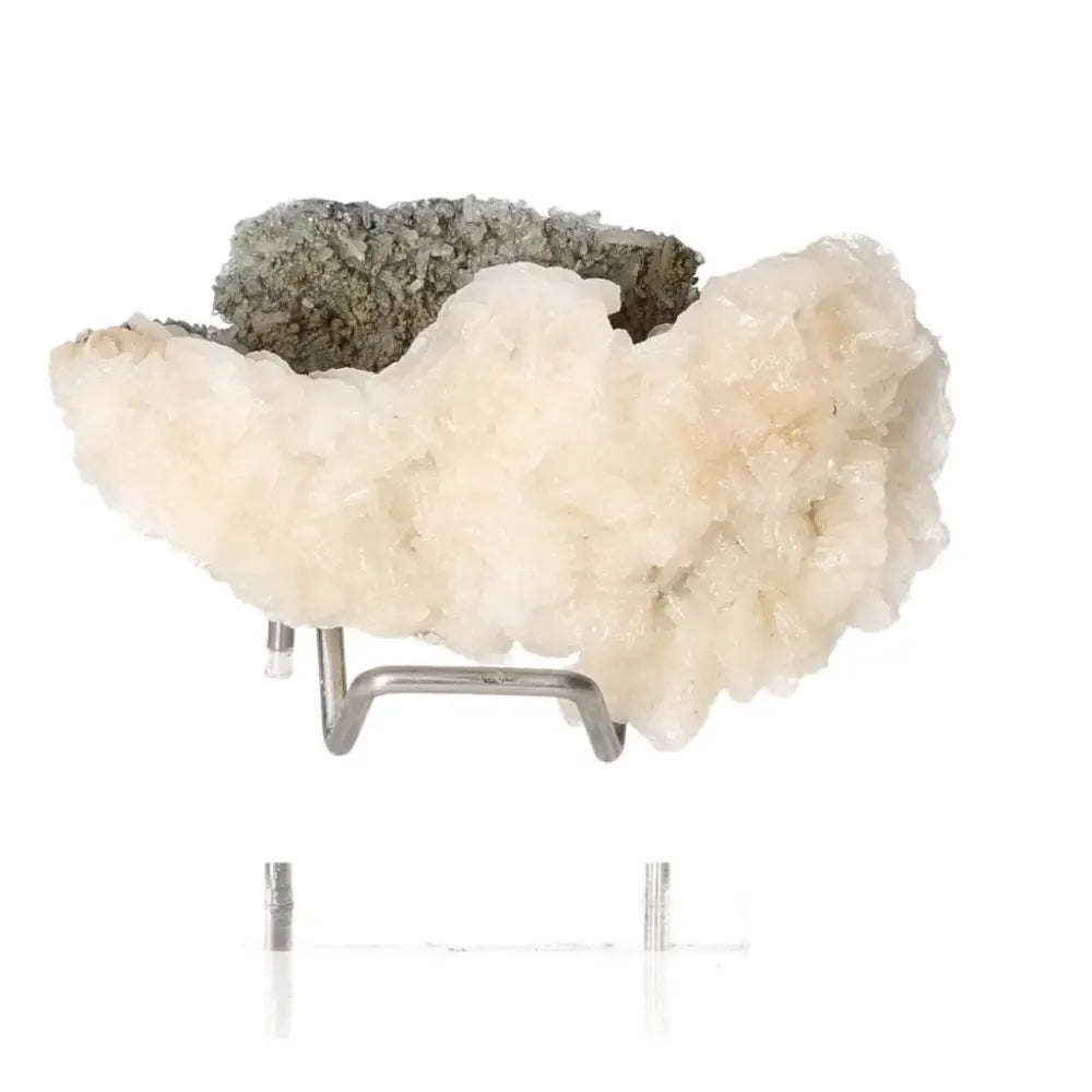 Natural Stilbite crystal displayed on stand, promoting serenity and creativity, ethically sourced by Sylvia Crystals.