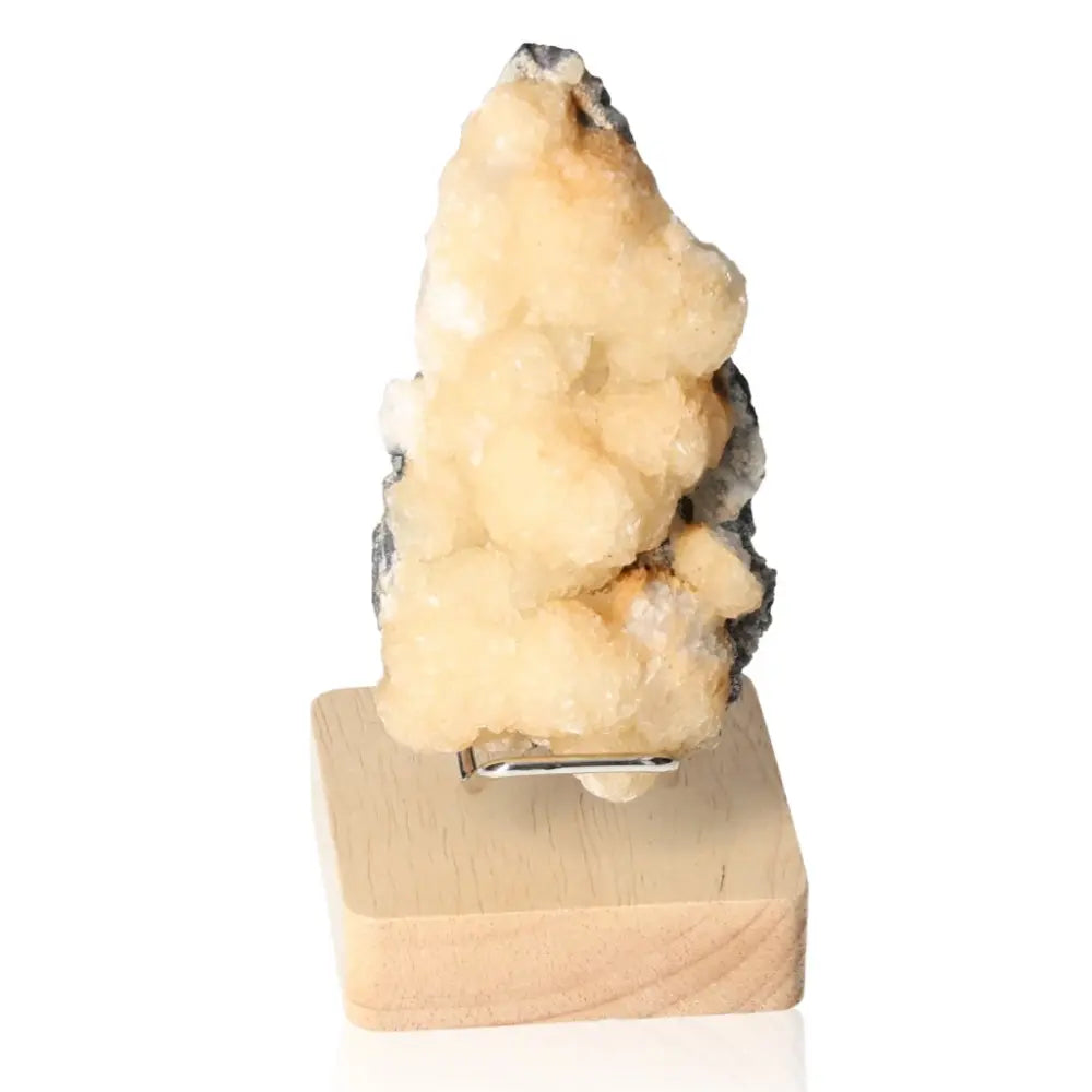 Honey Calcite with Galena crystal, a "Stone of Confidence," showcased on a stand for personal strength and motivation.