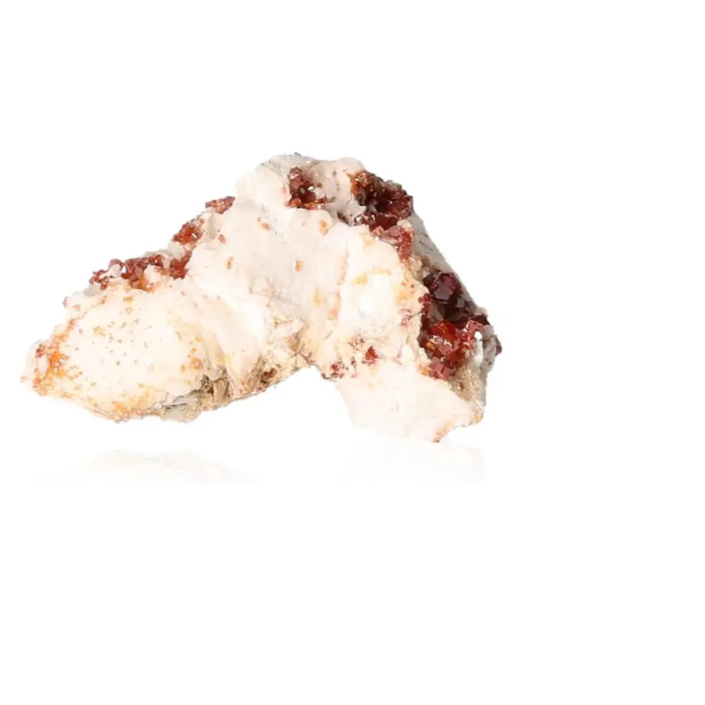 Vanadinite crystal with vibrant red-orange hues on white background, enhancing focus and creativity.