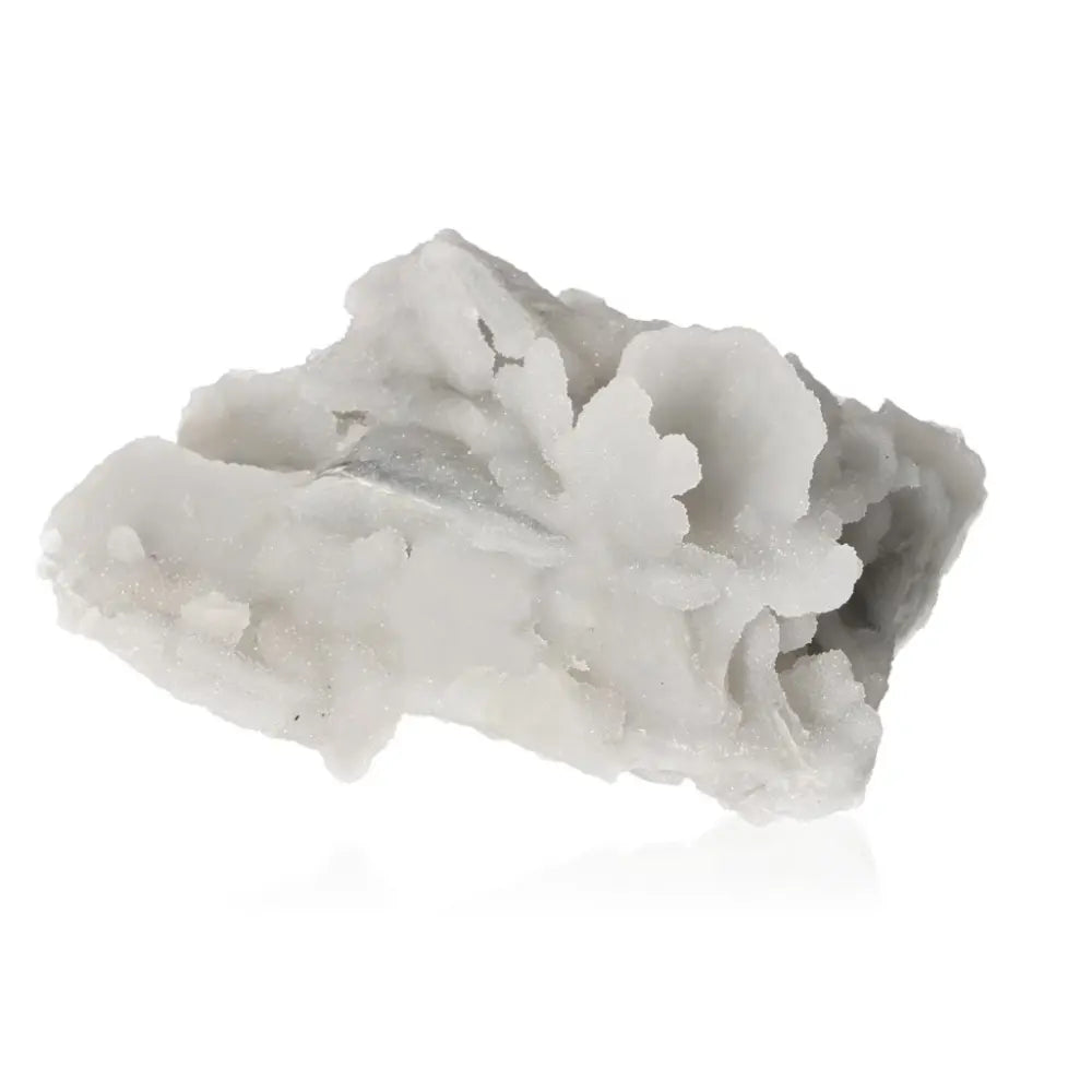 Misty grey Chalcedony gemstone with translucent appearance, promoting harmony, communication, and emotional healing.
