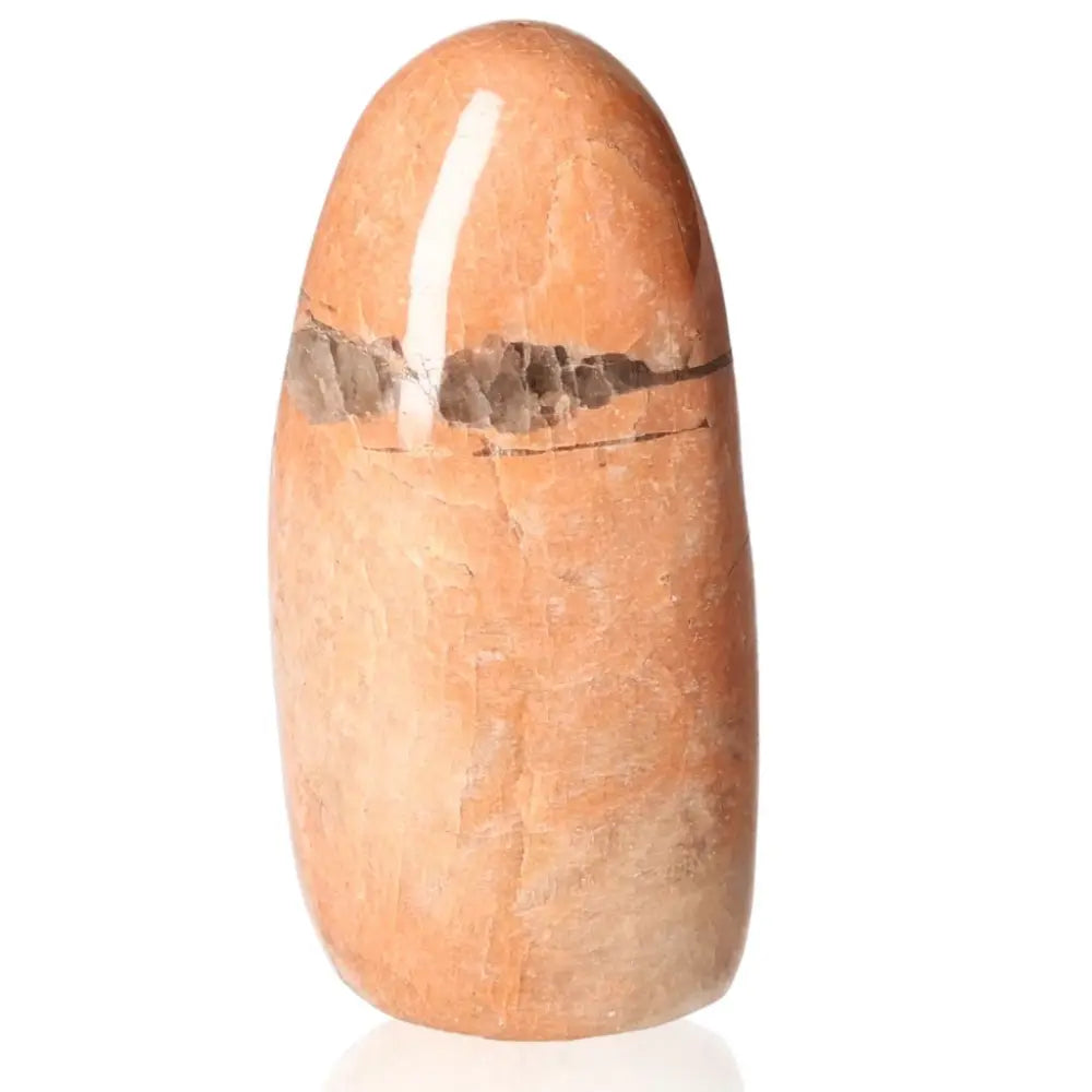 Peach Moonstone Free Form with gentle peach hue, known for calming and soothing properties, promoting new beginnings and emotional healing.