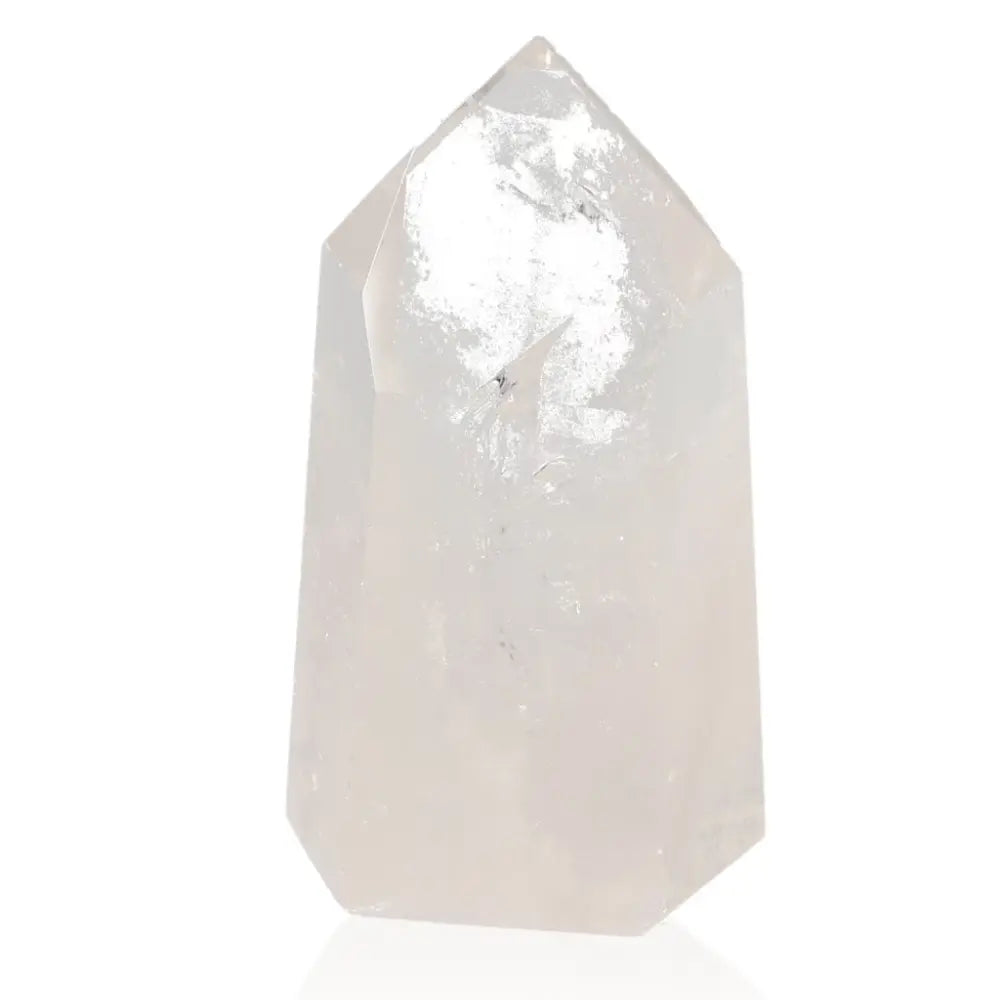 Lemurian Quartz Obelisk, a clear crystal quartz point known for its energy amplification and elegant transparency.