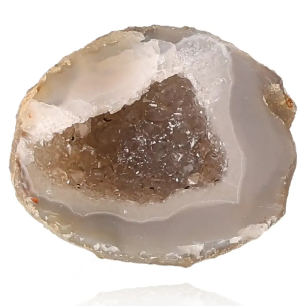 Mini Agate Geode featuring natural crystallized formations with intricate patterns, ideal for balance and tranquility.