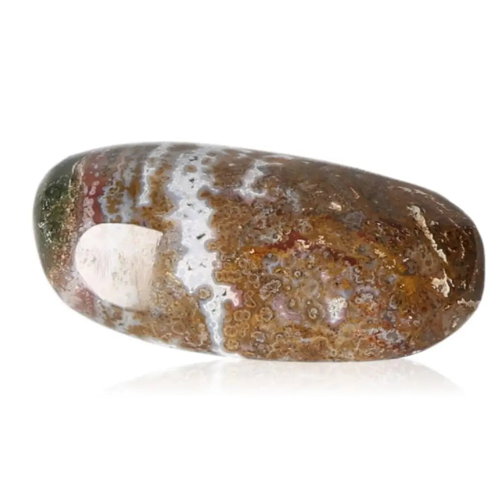 Polished Tumbled Jasper gemstone showcasing its earthy tones and intricate patterns, symbolizing tranquility and stress reduction.
