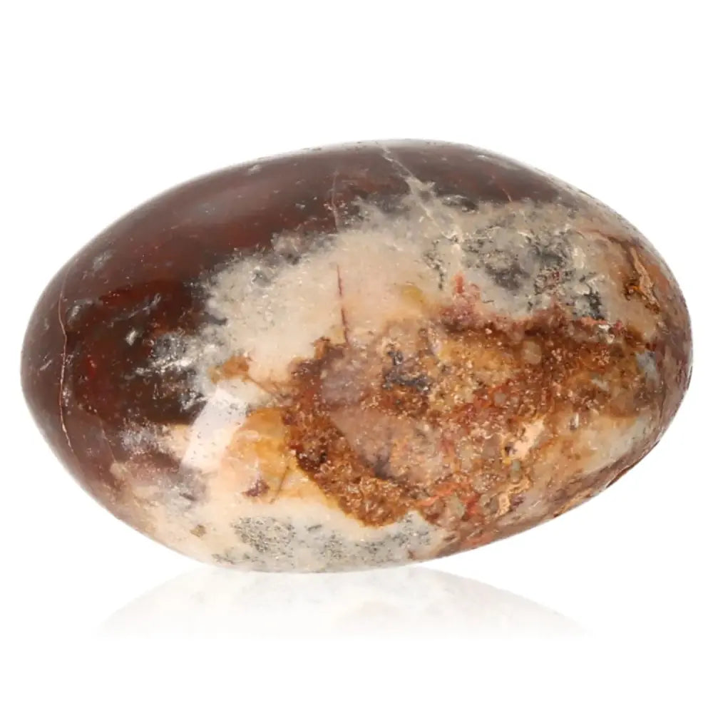 Tumbled Jasper crystal by Sylvia Crystals, showcasing rich earthy tones and intricate patterns, embodying harmony and conscious luxury.