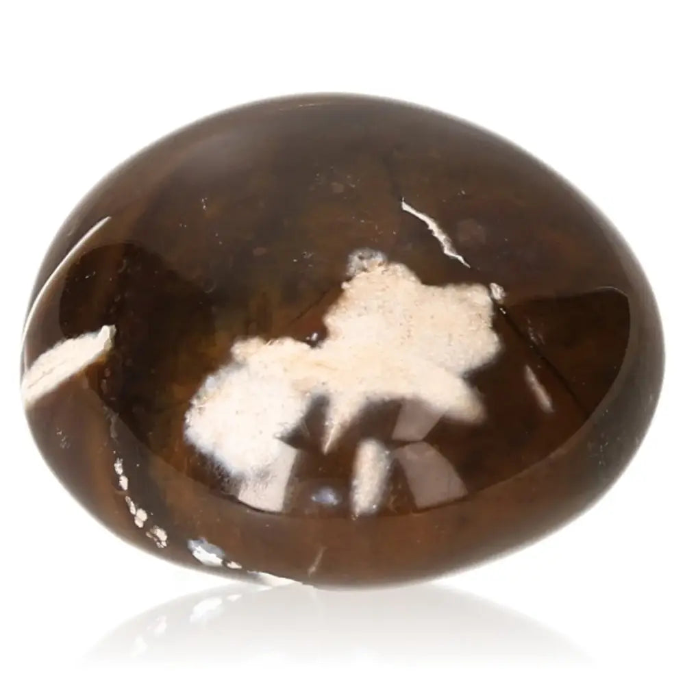 Close-up of a polished Tumbled Sardonyx gemstone, showcasing its unique colors and patterns for strength and protection.