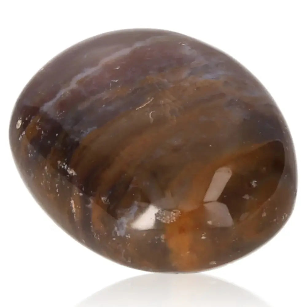 Tumbled Sardonyx stone with earthy tones and patterns, ideal for Chakra activation and grounding energy.