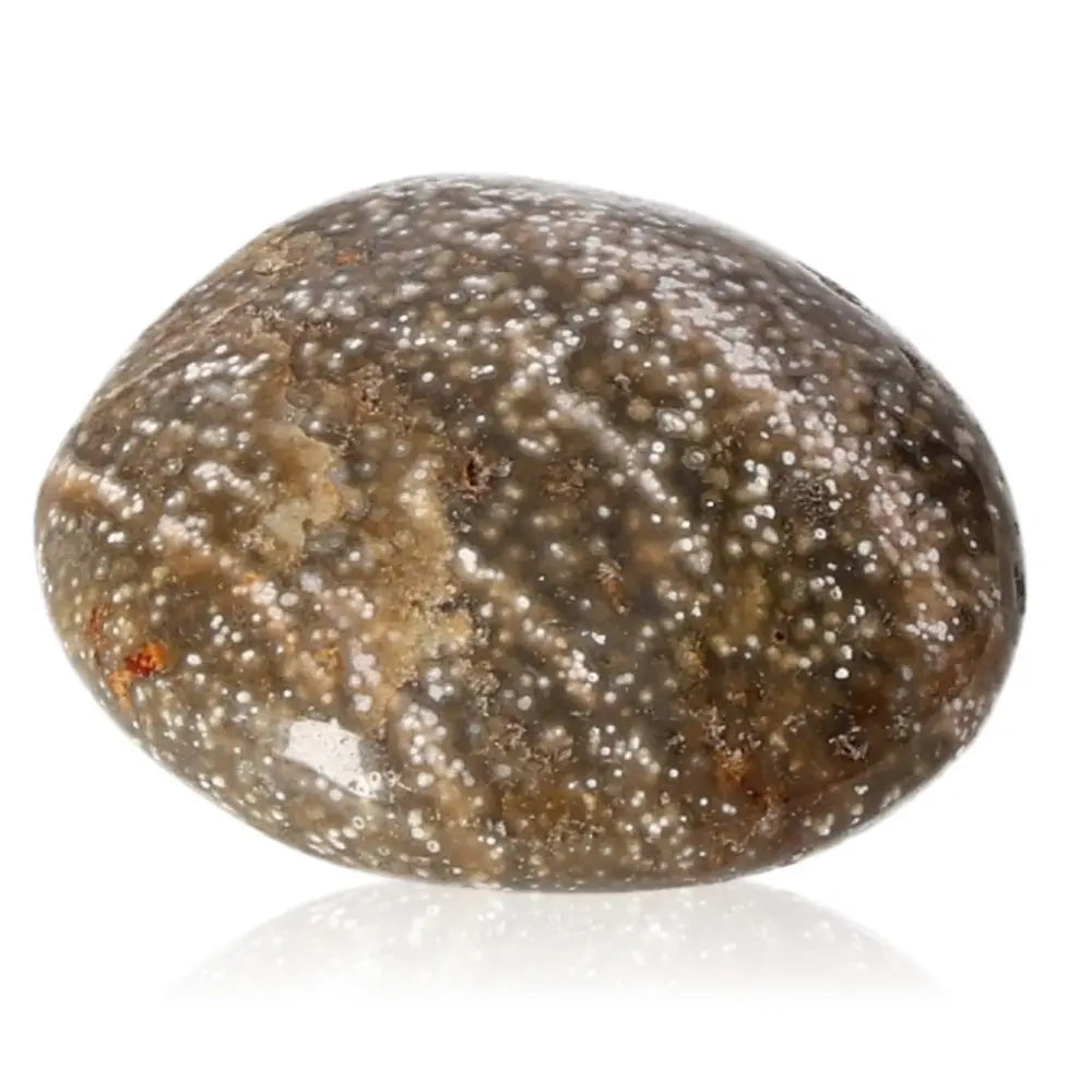 Tumbled Jasper gemstone, promoting tranquility and balance with its natural beauty and serene spirit.