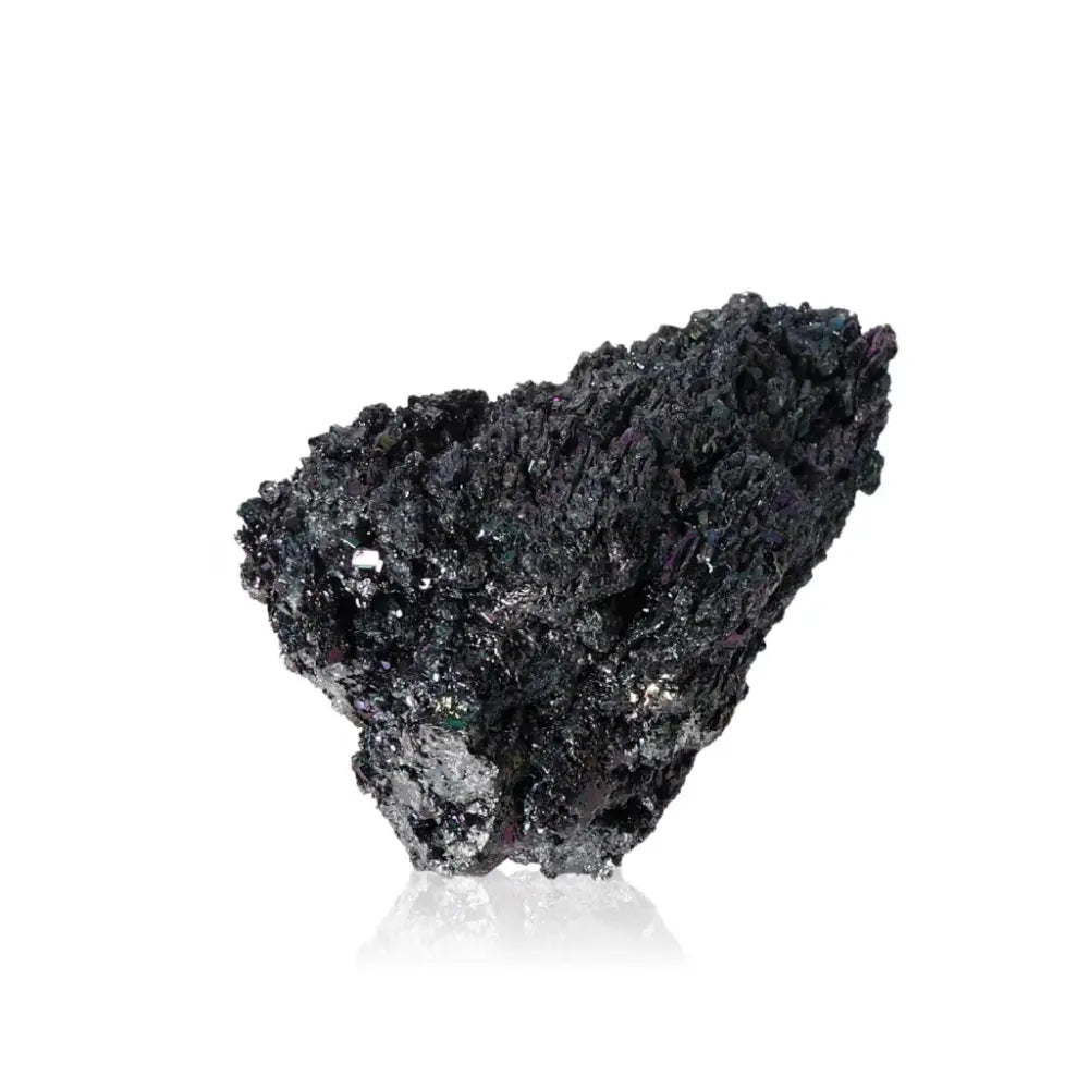 Carborundite crystal showing its shimmering rainbow surface, symbolizing energy amplification and transformation.