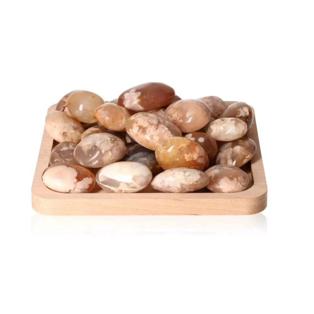 Tray of Flower Agate Palm Stones L showcasing intricate floral patterns and serene colors.