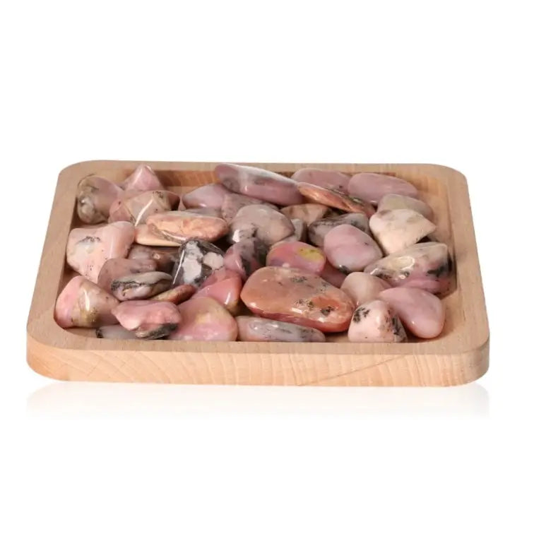 Tray of tumbled opal crystals for stimulating love, reigniting passion, and enhancing cosmic consciousness.